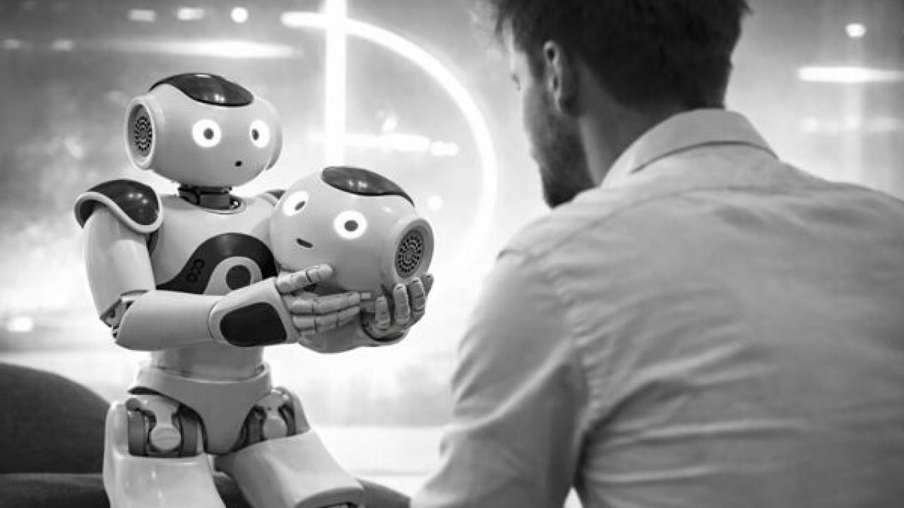 man with robot